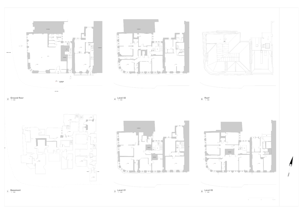 Architectural building floor plans across multiple levels.